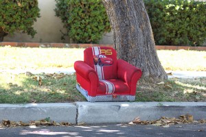 Red Chair By the Curb